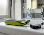 Modern hybrid electric grooming razor with replacement blade cartridge